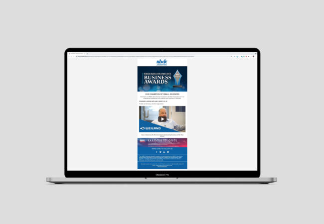 macbook with image of email