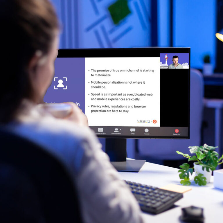 Person at computer watching webinar.